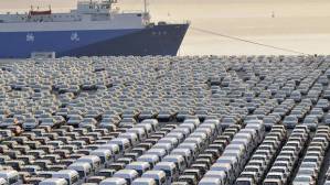 Chinese cars wait to be exported at a port in Dalian, Liaoning province. (China Daily/Reuters)