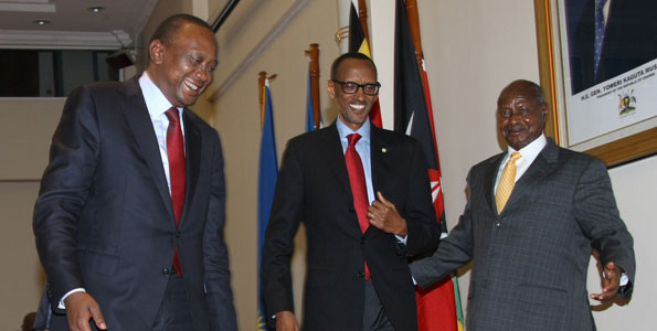 Presidents Uhuru Kenyatta (Kenya), Paul Kagame (Rwanda) and Yoweri Museveni after the trilateral talks in Entebbe, Uganda. President Jakaya Kikwete of Tanzania and Pierre Nkurunziza of Burundi stayed out of the loop of the third infrastructure summit in Kigali, Rwanda on Monday. [Photo/PPS]  