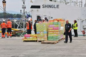 Revenue officials unload the Shingle at Dublin Port after 32 million cigarettes were seized [Picture: Irish Mirror]